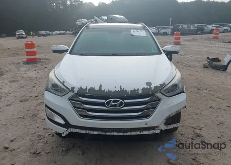 2014 Hyundai Santa Fe Sport 2.4L z USA, uszkodzony, nr VIN 5XYZUDLBXEG210414